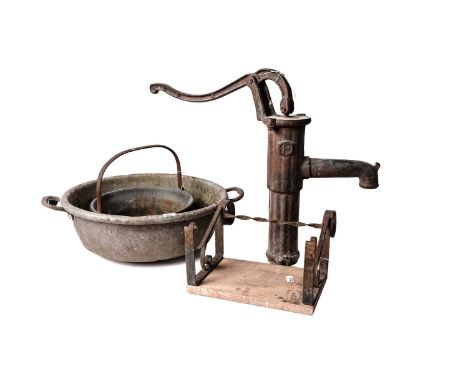 A vintage cast iron water pump, with fluted body and curved handle, 55cms high; together with a selection of other cast and w