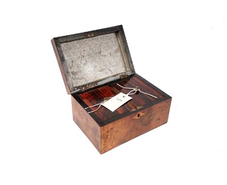 A 19th Century walnut tea caddy, inlaid with various woods, the hinged lid opening to reveal two compartments, with simulated