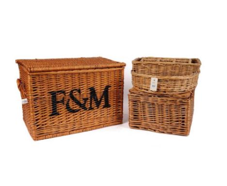 A vintage wicker picnic basket, by Fortnum &amp; Mason, with hinged lid, painted ‘F&amp;M’ to the front, 56 x 38.5 x 38cms wi