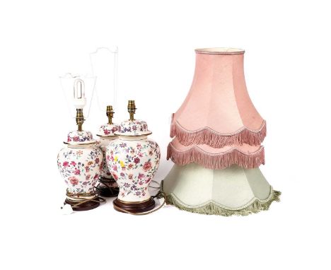 A Chinese style table lamp, decorated with flowering branches in pink and orange, on a cream background, with gilt rims, rais