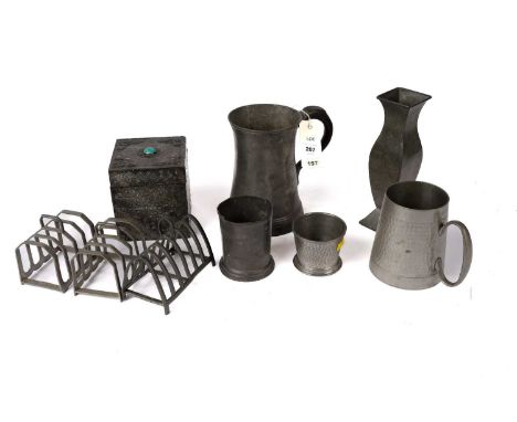 A Victorian pewter quart tankard, 17.5cms high; together with a selection of decorative pewter wares, including: a pewter cas
