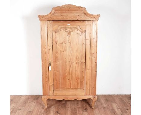 A modern carved pine wardrobe in the French style, with a single panel door, 98 x 54 x 189cms.