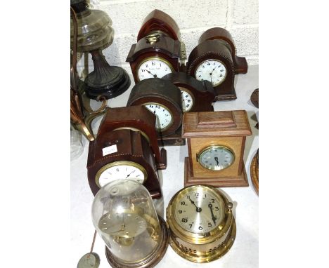 A mahogany miniature bracket clock case with French drum movement by Marti and ten other small mantel clocks, (mainly in need