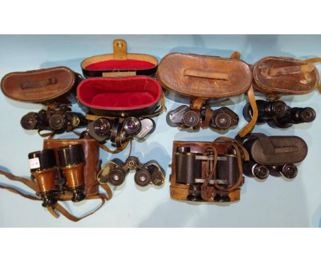 A collection of eight pairs of binoculars, including Goerz 8x Trieder, Carl Zeiss Jena Feldstecher 8 with two attached metal 