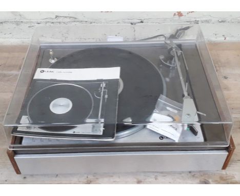 A Leak 13L turntable with instructions manual, cables and additional stylus.  
