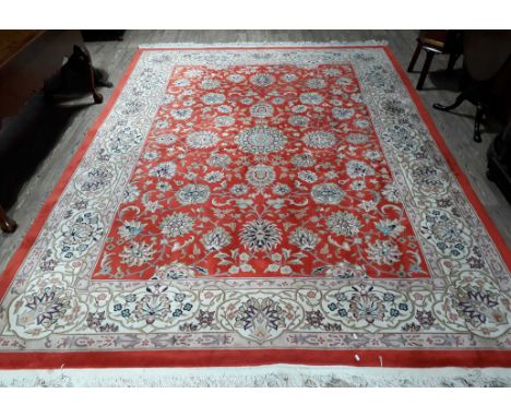 A large contemporary Chinese carpet, 265cm x 369cm.  