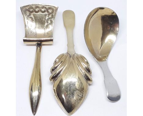 A group of three Georgian hallmarked silver gilt caddy spoons, various makers and dates.Condition: some minor dents to one sp