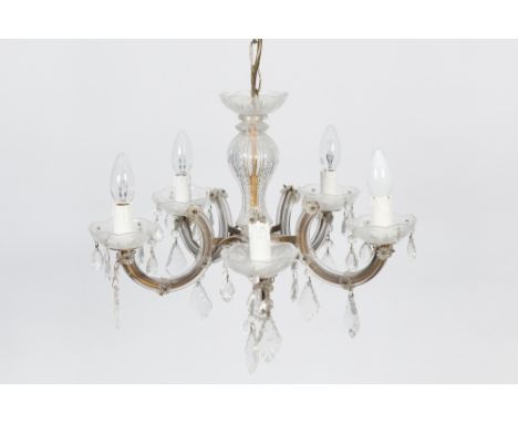 GILT METAL AND MOULDED GLASS FIVE LIGHT ELECTROLIER, with scroll arms, cut glass drops and baluster shaped central column, 32