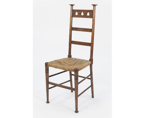 EARLY TWENTIETH CENTURY ARTS AND CRAFTS OAK SINGLE CHAIR, the top rail pierced with three heart shaped motifs, above two moul