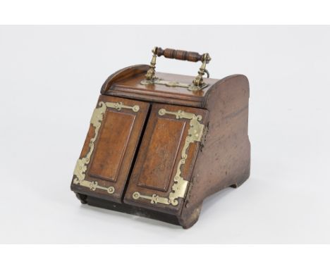 LATE VICTORIAN BRASS MOUNTED WALNUT TWO DOOR COAL PURDONIUM WITH AUTOMATED OPENING ACTION , of typical form, the turned top h