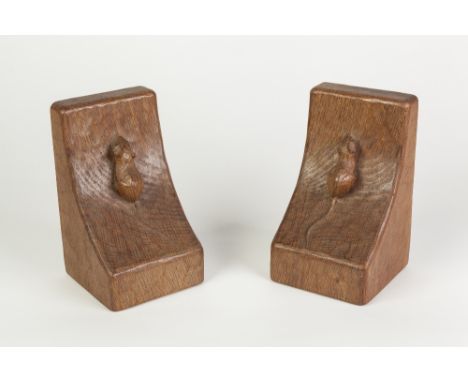 A PAIR OF ROBERT THOMPSON 'MOUSEMAN' ADZED OAK BOOK ENDS, each with carved mouse, 6 1/4" (16cm) high 