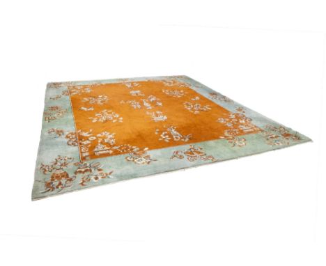 INDIAN CARPET, with chinoiserie  scattered decoration of vases of flowers and floral sprays on a brick red field, with simila