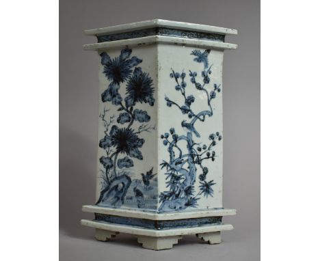 A Large Chinese Blue and White Vase of Lozenge Form. raised on Four Bracket Feet, Floral Decoration with Birds and Rocks. 28.