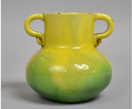 A Small CH Brannam Pottery Two Handled Vase, Produced for Liberty and Co. Green and Yellow Glaze, Impressed Mark to Base. 8cm