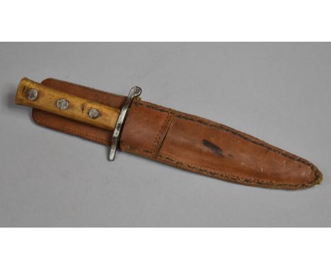 A Vintage Hunting Knife in Leather Sheath 
