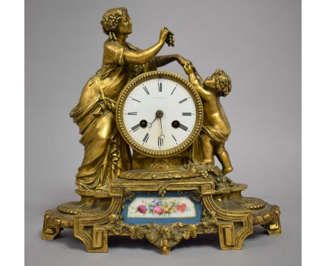 A 19th century French Ormolu Figural Bracket Clock of Baroque Design with Classical Maiden, Grapes and Child. The Enamelled D