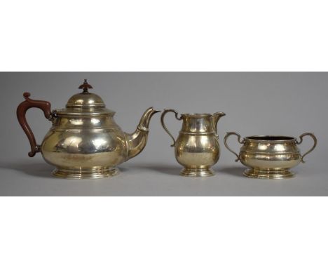 A Silver Three Piece Tea Service, Birmingham 1926 by Mappin and Webb, 906gms 