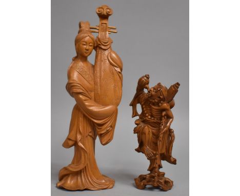 A Carved Chinese Wooden Figure of Maiden Holding Pipa Lute in Shawl together with a Carved Wooden Figure, Li Tieguai. 24cms a