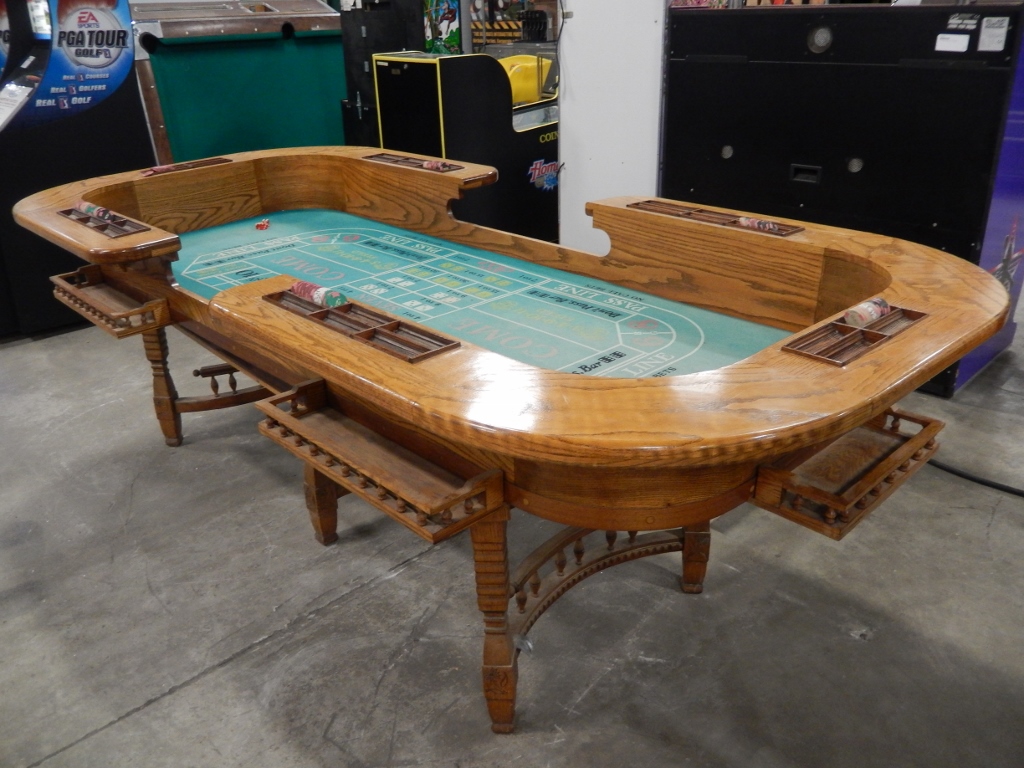 Used item Vintage craps table with clay chips and dice.