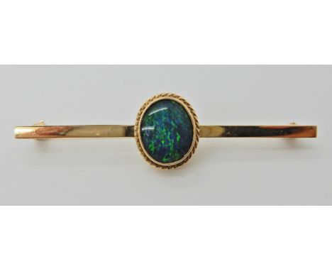 A 9ct opal triplet bar brooch, opal approx 11.5mm x 9.5mm, brooch dimensions 5.9cm x 1.4cm, weight 5gms