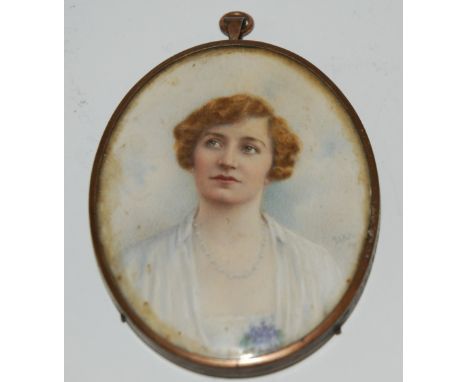 A painted portrait miniature of a lady on ivorine, in oval frame, 8 x 6cm