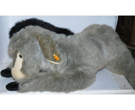 A large modern Steiff donkey, 80cm long