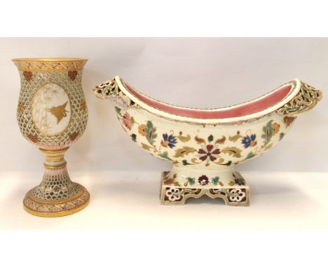 A Royal Worcester reticulated goblet with chinoiserie decoration, 19cm high together with Zsolnay style centrepiece (def) (2)