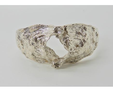 A Danish silver brutalist bangle by Knud V. Andersen for Anton Michelsen. Stamped AM Sterling Danmark KVA 925S, inner diamete