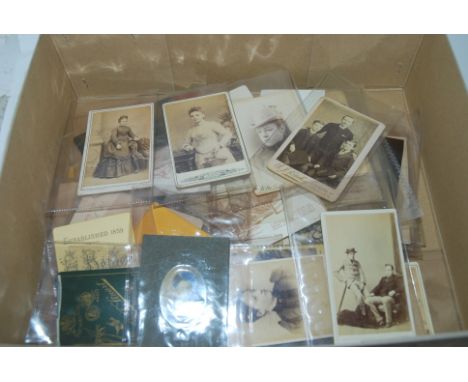 A collection of studio portrait cards