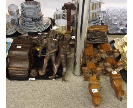 A wooden dogs head sash window stop with glass eyes, a pair of ecclesiastical style oak pillars and other wooden items Gilber