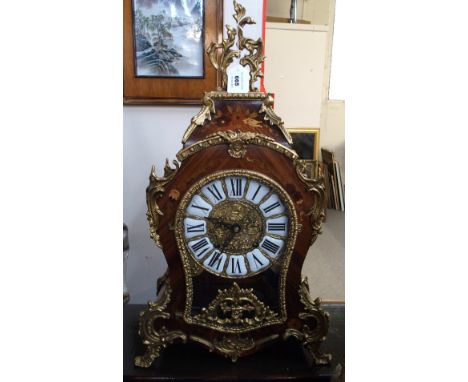 A 20th Century French inlaid mantle clock the ormolu dial with enamelled Roman numerals