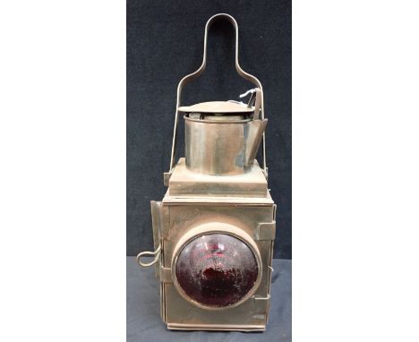 A RAILWAY LAMP, STAMPED 'BR(W)' with red bull's-eye 32cm high plus handle (drilled for electricity through stamp) 