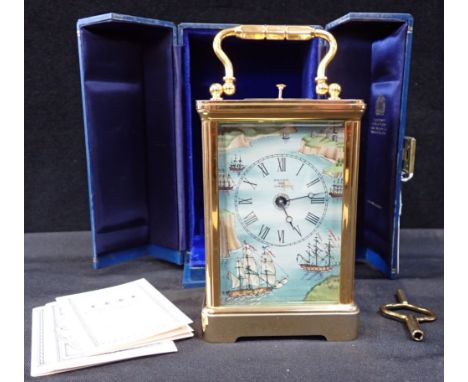 A HALCYON DAYS REPEATING CARRIAGE CLOCK with enamelled dial depicting sailing ships, 13.5cm high plus handle, boxed, working