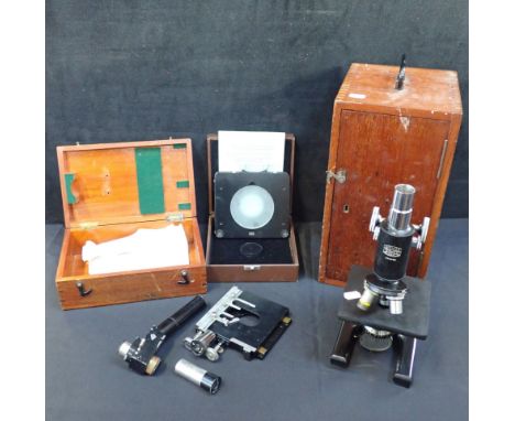 A SPENCER BUFFALO MICROSCOPE with a Watson floating stage (cased)