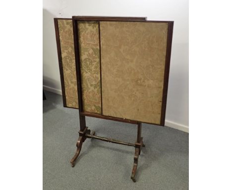 A 19TH CENTURY MAHOGANY FRAMED FIRESCREEN three panels, sliding to expand 126cm high