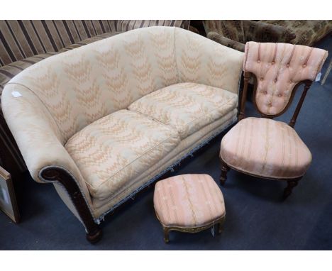 A 1920S OAK TUB SOFA 152cm wide, together with a Victorian walnut nursing chair, and a giltwood footstool (3)