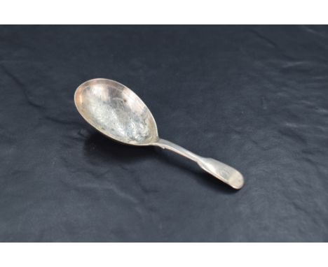 A Victorian silver fiddle pattern caddy spoon, the oval bowl with foliate bright-cut engraving, marks for London 1859, maker 