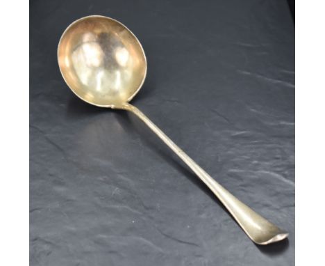 An early George III silver Hanoverian pattern ladle, the dished circular bowl issuing the long slender tapering stem with Han