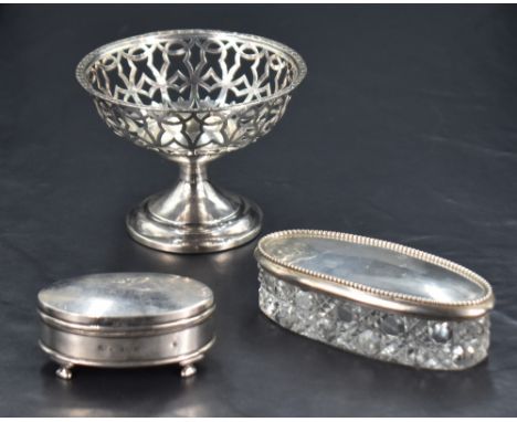 A George V silver pedestal dish, of circular form, pierced with repeating design and raised on a spreading and stepped circul