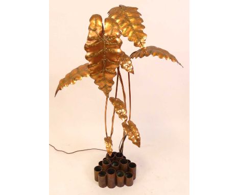 A 1970s Italian copper freestanding "leaf" floor lamp, having four branch arms over three lower smaller decorative examples, 