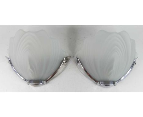 A pair of Art Deco style chromed metal and moulded frosted glass inset fan shaped wall lights, each 23 x 31cm