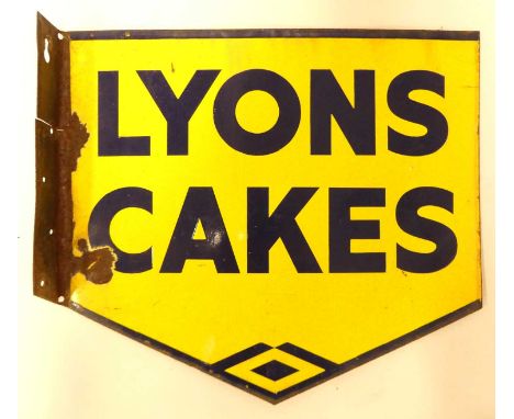 An early 20th century enamel on metal wall mounted advertising sign for 'LYONS CAKES', flanged on one side with affixing poin