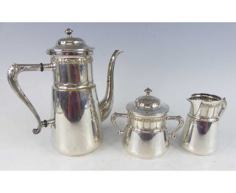 An early 20th century WMF silver plated three-piece coffee set in the Secessionist taste, each piece with stylised flower hea