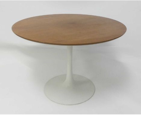 Eero Saarinen (1910-1961) for Arkana - a teak laminate circular 'Tulip' table, raised on white painted cast metal base, raise