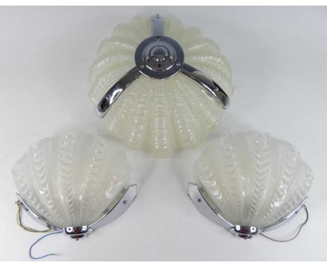A pair of Art Deco chromed metal and moulded glass inset fan shaped wall lights, together with a near-matching ceiling pendan