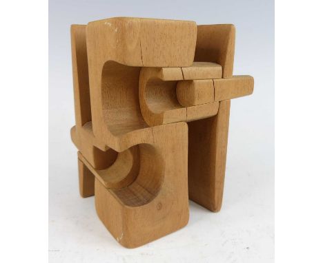  Brian Willsher (1930-2010) - an interlocking opposing abstract wood sculpture, with protruding sections, signed in pen Brian