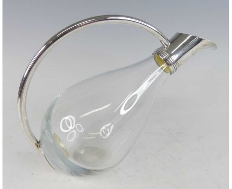 A contemporary Asprey silver mounted and clear glass bodied carafe, with stylised loop handle, the silver hallmarked London 2