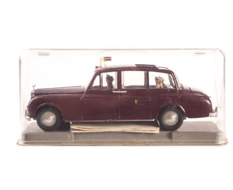 A Tri-ang Spot-On No.260 Royal Rolls-Royce Phantom V, maroon body, flag to roof, four figures, in original perspex case with 