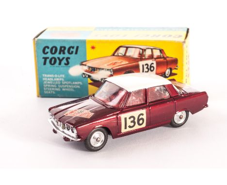 A Corgi Toys 322 Rover 2000, in Monte Carlo Trim, metallic maroon body, white roof, leaflet, in original box, E, box VG 