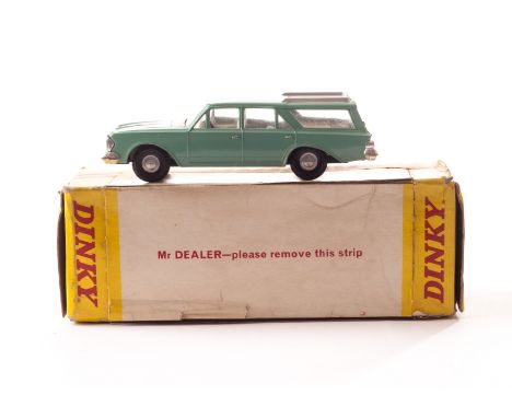 A Hong Kong Dinky Toys 57/006 Rambler Classic, light green body, silver roof trim, cream interior, in original export box, VG